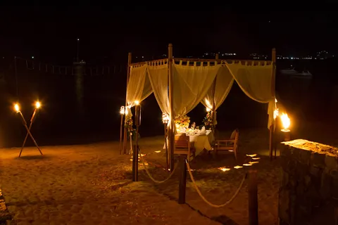 Romantic proposal idea with candles and decorations in Santorini