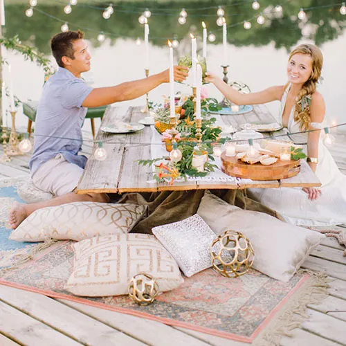 Private dinner proposal table overlooking the Santorini caldera