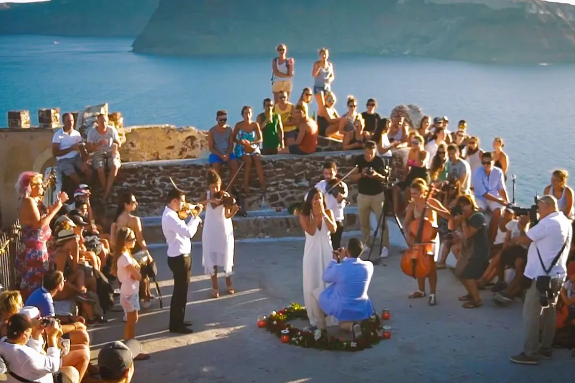 ruins of the Fortress of Oia above the caldera at dusk