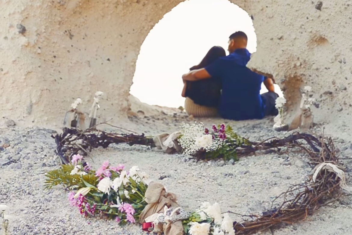 heart of candles at a Santorini caldera proposal spot