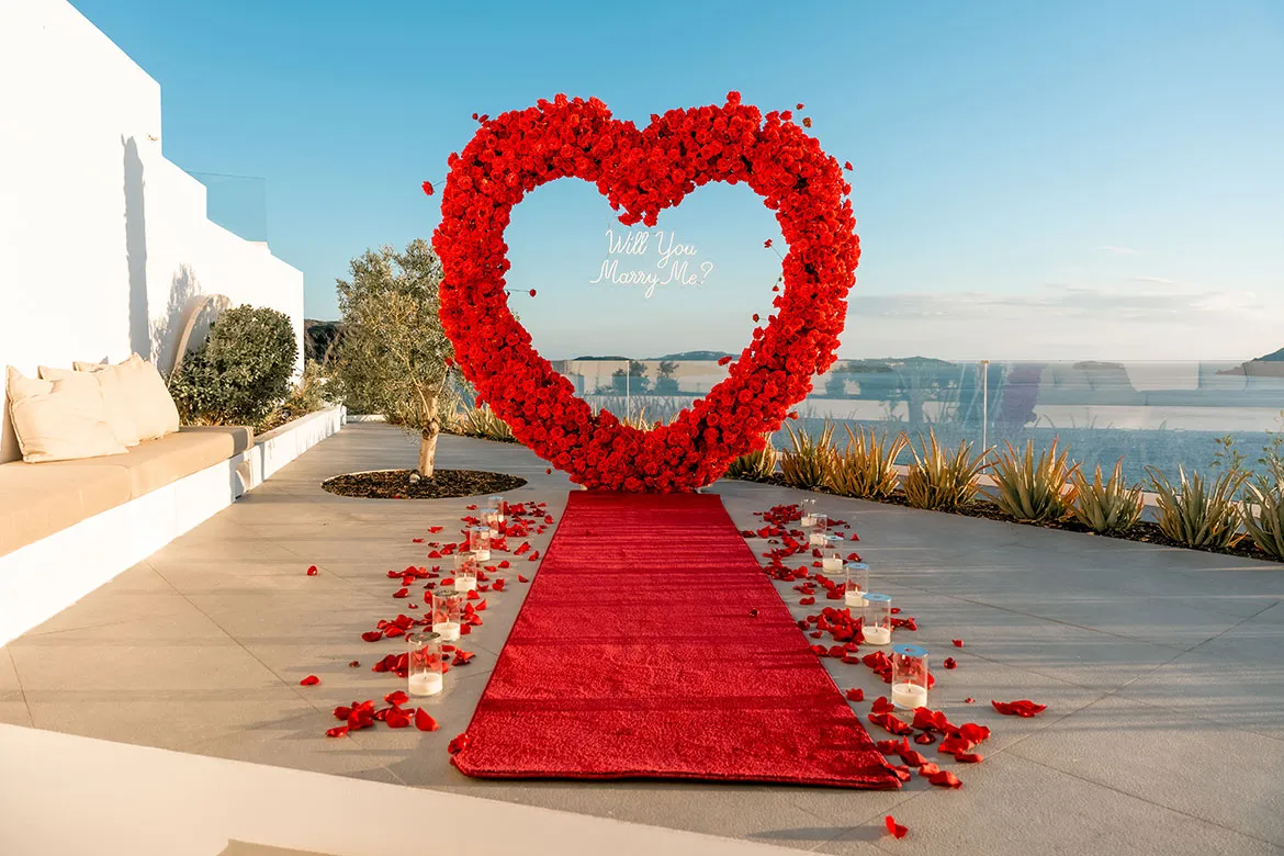couple during a Santorini proposal, tips and answers
