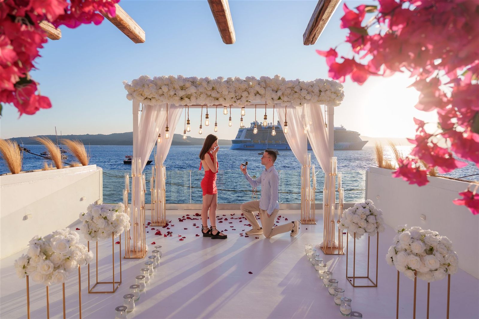 Santorini proposal red dress cruise ship