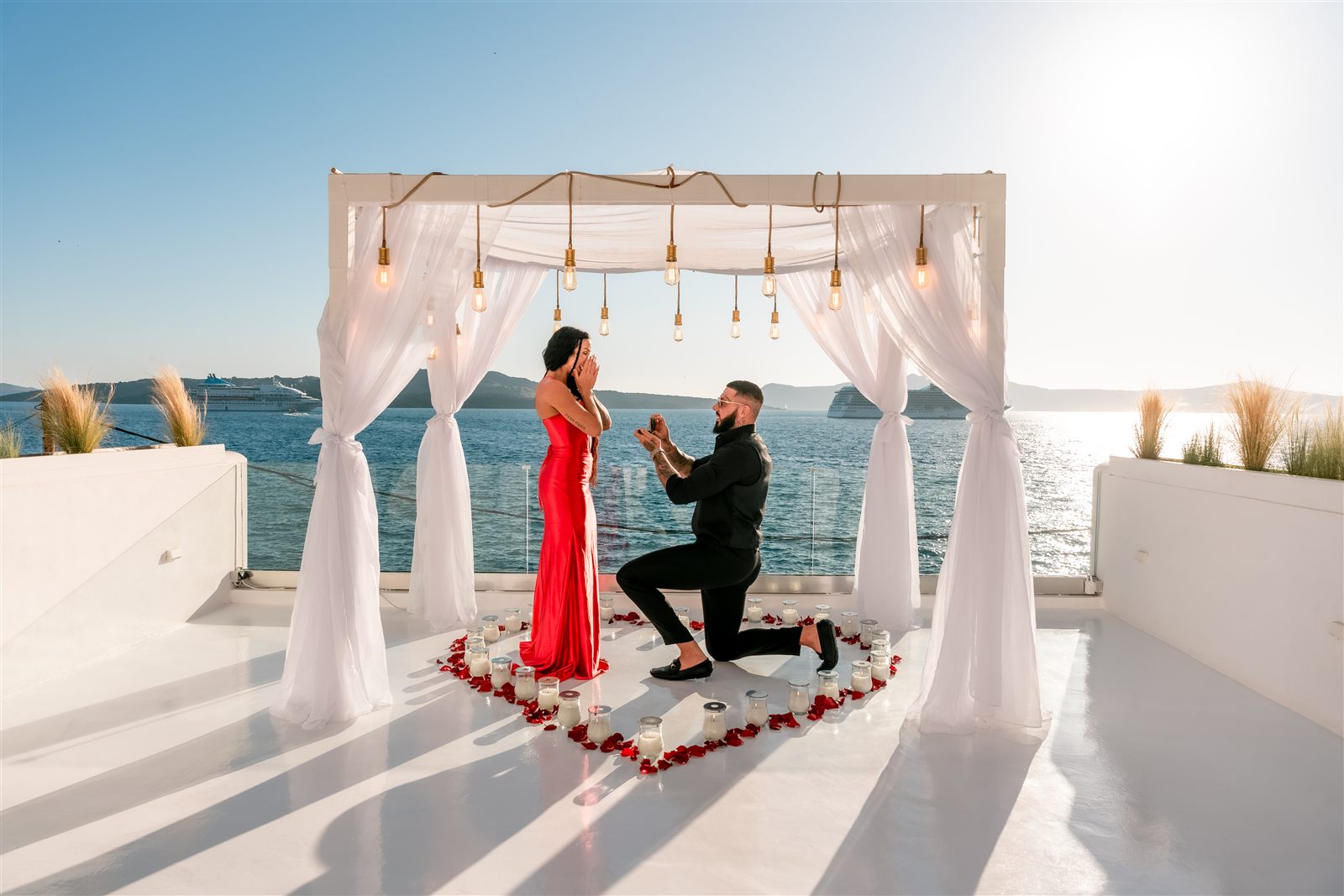 Santorini proposal red dress heart platform