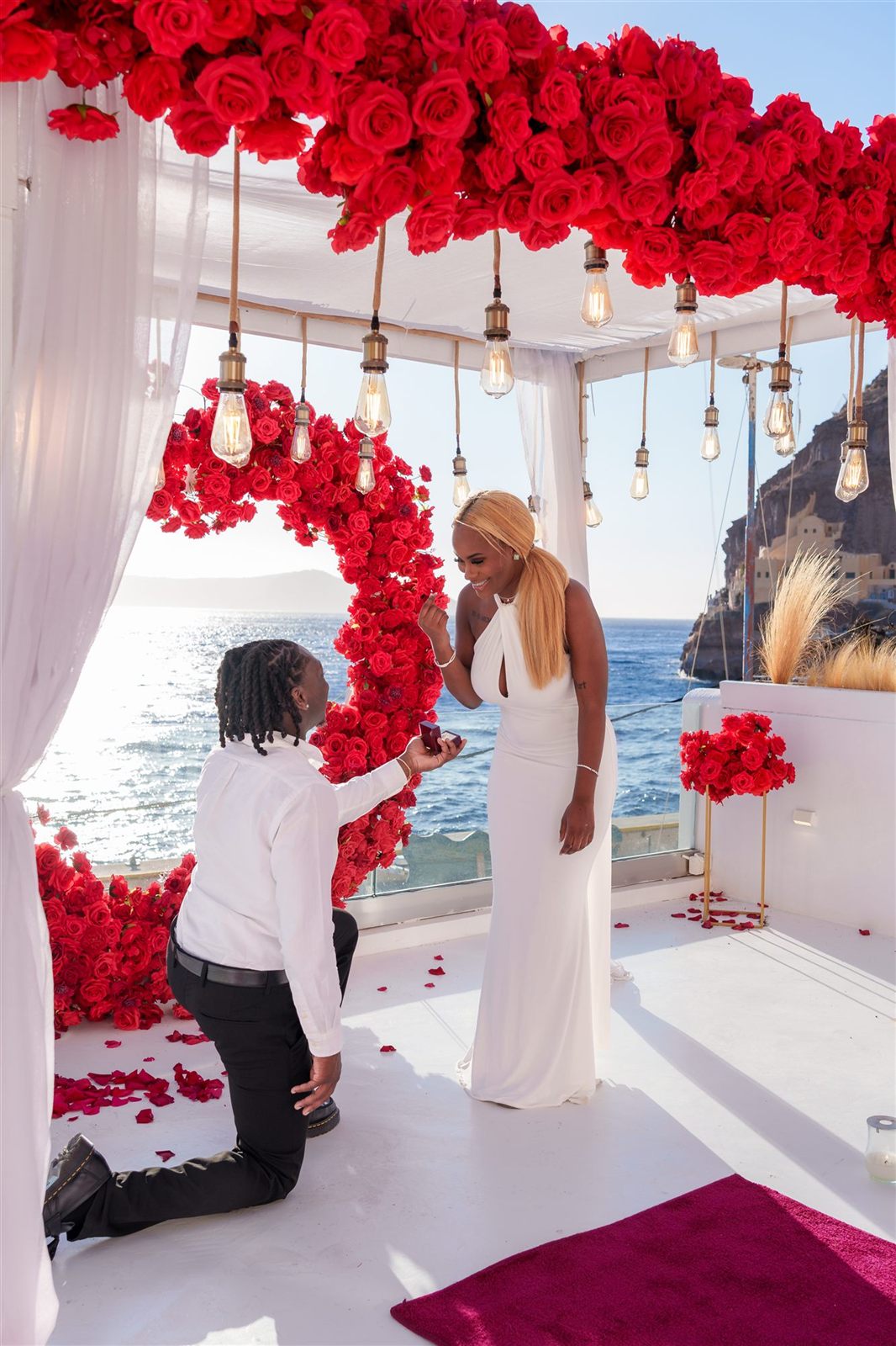 Santorini proposal through red wreath