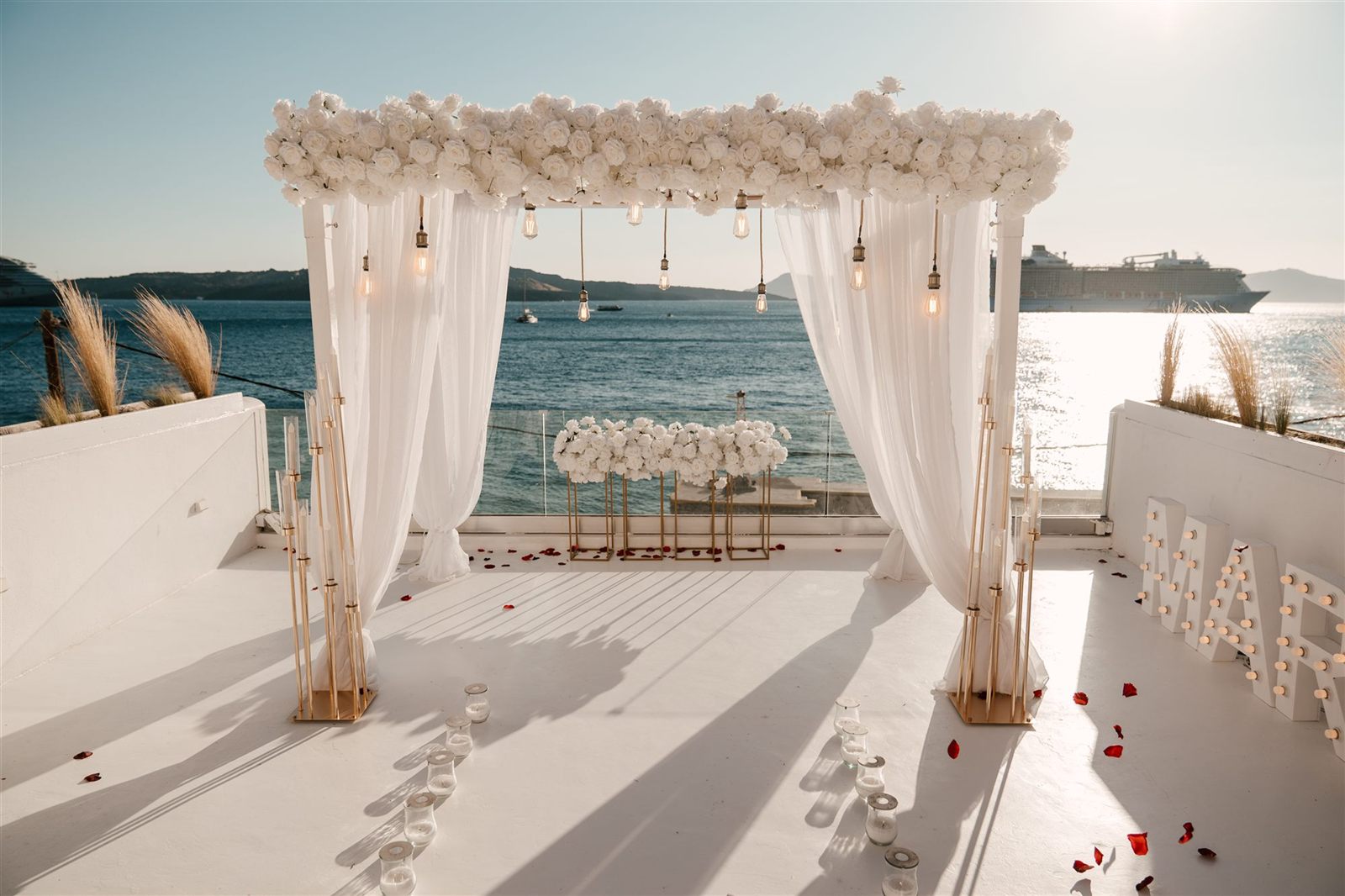 Santorini wedding white arch sea view